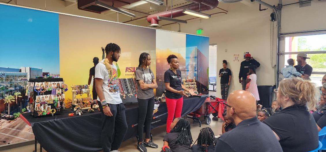 The All My Creatures team engaging a community event crowd.